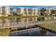 View of community with bridge and water features at 1200 Country Club Dr # 5402, Largo, FL 33771