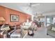 Living room with leather sofas and dining area view at 1200 Country Club Dr # 5402, Largo, FL 33771