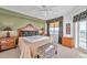 King-size bed in spacious bedroom with golf course views at 1200 Country Club Dr # 5402, Largo, FL 33771