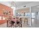 Dining area with table and kitchen view at 1200 Country Club Dr # 5402, Largo, FL 33771