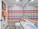 Clean bathroom with shower/tub and updated fixtures at 1200 Country Club Dr # 5402, Largo, FL 33771