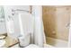 Bathroom with granite countertop and shower/tub combo at 692 Bayway Blvd # 202, Clearwater Beach, FL 33767