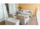 Comfortable balcony furniture with seating for relaxing at 692 Bayway Blvd # 202, Clearwater Beach, FL 33767