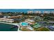 Aerial view of community, showing pool, buildings, and waterfront location at 5130 Brittany S Dr # 408, St Petersburg, FL 33715