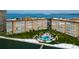 Aerial view of waterfront community with pool at 5130 Brittany S Dr # 408, St Petersburg, FL 33715