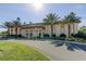 Inviting community center with palm trees and landscaping at 5130 Brittany S Dr # 408, St Petersburg, FL 33715