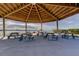 Covered gazebo with picnic tables offering scenic waterfront views at 5130 Brittany S Dr # 408, St Petersburg, FL 33715