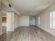 Spacious living room featuring hardwood floors and ceiling fan at 5130 Brittany S Dr # 408, St Petersburg, FL 33715