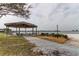 Scenic waterfront gazebo with picnic tables and grills at 5130 Brittany S Dr # 408, St Petersburg, FL 33715