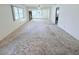 Large living room with access to multiple rooms at 11200 102Nd Ave # 51, Seminole, FL 33778
