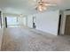 Bright living room featuring ample space and ceiling fans at 11200 102Nd Ave # 51, Seminole, FL 33778