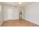 Neutral-toned bedroom with laminate flooring, offering both functionality and aesthetic appeal at 1442 Normandy Park Dr # 1, Clearwater, FL 33756