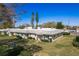 White exterior building with green accents and lush lawn at 1442 Normandy Park Dr # 1, Clearwater, FL 33756