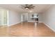 Living room with hardwood floors and kitchen view at 1442 Normandy Park Dr # 1, Clearwater, FL 33756