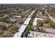 Aerial view of a large community, showing numerous buildings, roads, and landscaping at 1442 Normandy Park Dr # 1, Clearwater, FL 33756