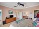 Relaxing main bedroom featuring a ceiling fan, closet, dresser, and neutral walls at 3503 10Th W Ln, Palmetto, FL 34221