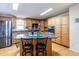 Well-equipped kitchen with granite island and breakfast bar at 18675 Us Highway 19 N # 377, Clearwater, FL 33764