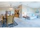Comfortable living room with a sofa and rocking chair, offering lots of natural light at 18675 Us Highway 19 N # 377, Clearwater, FL 33764