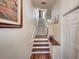 Bright entryway with hardwood floors and staircase leading upstairs at 3503 10Th W Ln, Palmetto, FL 34221