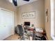 Home office with desk, chair, and built-in shelving at 3503 10Th W Ln, Palmetto, FL 34221