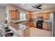 Modern kitchen with granite countertops and breakfast bar at 3503 10Th W Ln, Palmetto, FL 34221