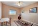 Bedroom with window, ceiling fan, and exercise equipment at 3503 10Th W Ln, Palmetto, FL 34221