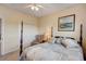 Spacious bedroom with a comfortable bed, chair, and ample closet space at 3503 10Th W Ln, Palmetto, FL 34221