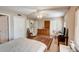 Spacious bedroom with wood floors, built-in shelving, and en-suite bathroom at 3503 10Th W Ln, Palmetto, FL 34221