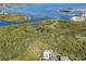 Aerial photo showing waterfront property and mangroves at 3503 10Th W Ln, Palmetto, FL 34221