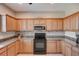 Well-equipped kitchen featuring granite countertops and ample cabinetry at 3503 10Th W Ln, Palmetto, FL 34221