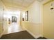 Clean and well-lit hallway with tile flooring and neutral wall colors at 1621 Gulf Blvd # 1606, Clearwater, FL 33767