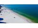 Aerial view of beach with pier, showing white sand and clear water at 1621 Gulf Blvd # 1606, Clearwater, FL 33767