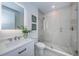 Modern bathroom with a walk-in shower and updated vanity at 12305 3Rd E St # 1, Treasure Island, FL 33706