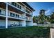 Elevated patio with seating area and modern building at 12305 3Rd E St # 1, Treasure Island, FL 33706
