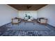 Relaxing outdoor patio with seating area and rug at 12305 3Rd E St # 2, Treasure Island, FL 33706
