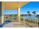 Spacious balcony overlooking the water, with comfortable seating and stunning views at 755 Collany Rd # 401, Tierra Verde, FL 33715