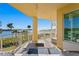 Spacious balcony with stunning water views and comfortable seating at 755 Collany Rd # 401, Tierra Verde, FL 33715