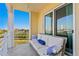 Relaxing balcony with outdoor seating and water views at 755 Collany Rd # 401, Tierra Verde, FL 33715