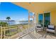 Relaxing balcony offering breathtaking views and comfortable seating at 755 Collany Rd # 401, Tierra Verde, FL 33715
