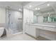 Spa-like bathroom with double vanity, large shower, and soaking tub at 755 Collany Rd # 401, Tierra Verde, FL 33715