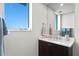 Small bathroom with single vanity and window at 755 Collany Rd # 401, Tierra Verde, FL 33715