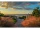 Private path leading to a scenic beach at sunset at 755 Collany Rd # 401, Tierra Verde, FL 33715
