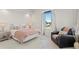 Spacious bedroom with a comfortable bed and sitting area at 755 Collany Rd # 401, Tierra Verde, FL 33715