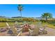 Relaxing fire pit area with comfortable seating overlooking the water at 755 Collany Rd # 401, Tierra Verde, FL 33715