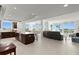 Open concept kitchen boasts island, stainless steel appliances, and ample cabinet space at 755 Collany Rd # 401, Tierra Verde, FL 33715