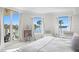 Spacious main bedroom with water views, abundant natural light, and room for a sitting area at 755 Collany Rd # 401, Tierra Verde, FL 33715