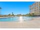 Inviting community pool with ample deck space at 755 Collany Rd # 401, Tierra Verde, FL 33715