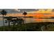 Breathtaking sunset over calm waters and islands at 755 Collany Rd # 401, Tierra Verde, FL 33715
