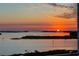 Spectacular sunset view over calm water and islands at 755 Collany Rd # 401, Tierra Verde, FL 33715