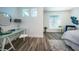 Bright bedroom with a workspace and ample natural light at 12305 3Rd E St # 3, Treasure Island, FL 33706